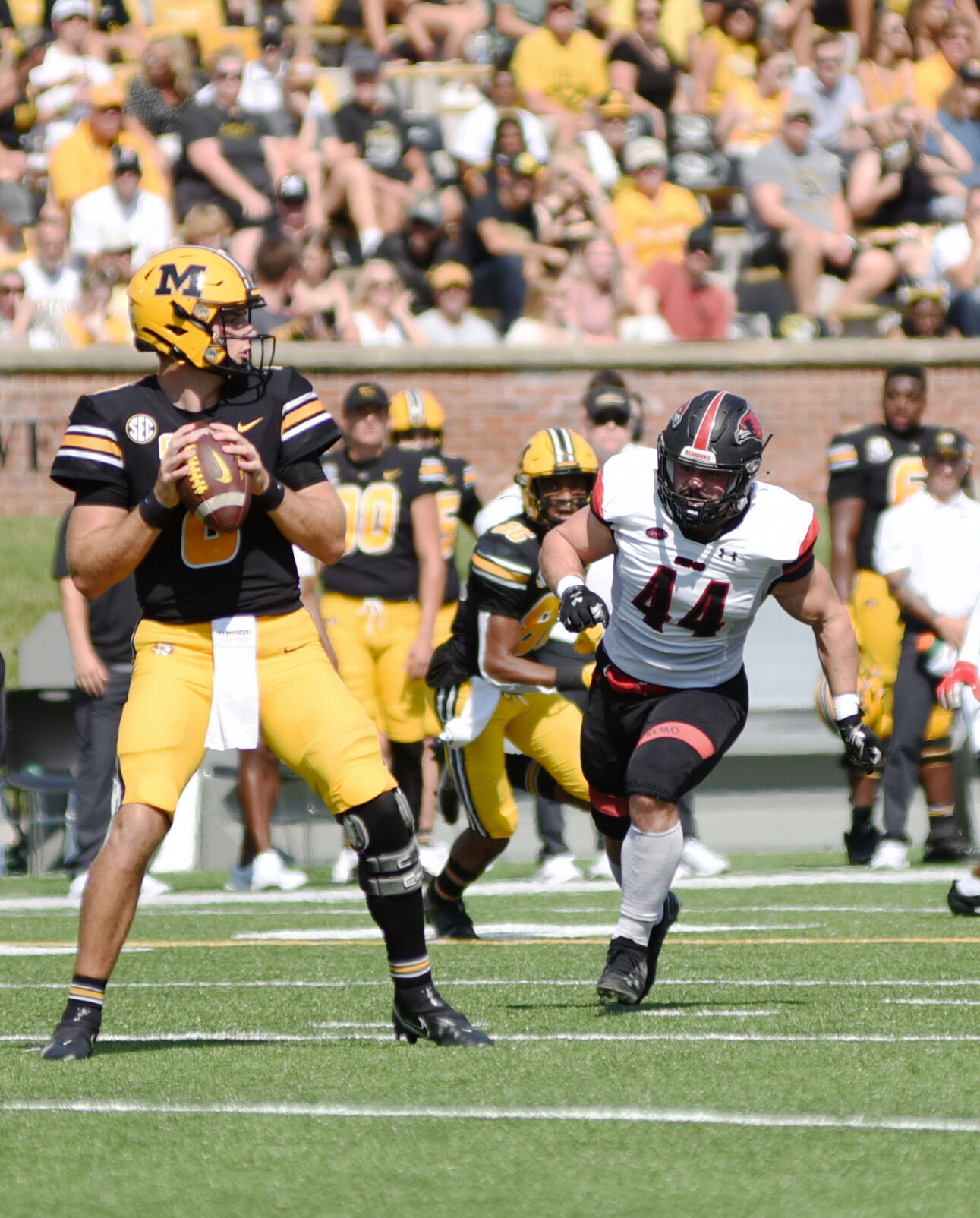 Connor Bazelak prepares to throw
